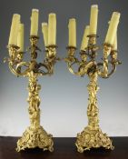 A pair of 19th century ormolu rococo style five branch candelabra, 24in. A pair of 19th century