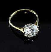 An 18ct gold and solitaire diamond ring, size O. An 18ct gold and solitaire diamond ring, the