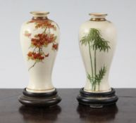 Two Japanese Satsuma pottery small baluster vase, wood stands Two Japanese Satsuma pottery small