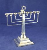 A 1950`s silver Hanukkah Menorah, weighted. A 1950`s silver Hanukkah Menorah, with tapered squared
