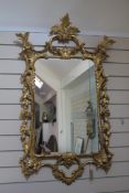 A 20th century Chippendale revival giltwood wall mirror, 3ft 9.5in x 2ft 3.5in. A 20th century