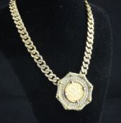 An 18ct gold and diamond octagonal pendant with inset USA five dollar gold coin, pendant 2in. An