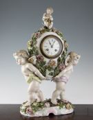 A Sitzendorf porcelain figural mantel clock, late 19th century, 18.75in. A Sitzendorf porcelain