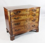 A George III serpentine mahogany chest, W.3ft 4in. A George III serpentine mahogany chest, of four