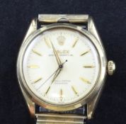 A gentleman`s 1940`s gold plated and stainless steel Rolex Oyster perpetual wrist watch, A