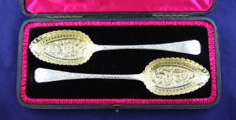 A cased pair of George IV silver Old English pattern table spoons, A cased pair of George IV