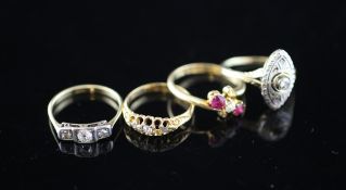 Four early 20th century 18ct gold and diamond dress rings, sizes K,M,N & O. Four early 20th