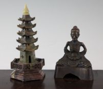 A Chinese bronze seated figure of Buddha and a soapstone model A Chinese bronze seated figure of