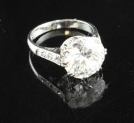 A 1940`s/1950`s platinum and solitaire diamond ring, size J. A 1940`s/1950`s platinum and