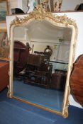 A 19th century French cream painted and parcel gilt overmantel mirror A 19th century French cream