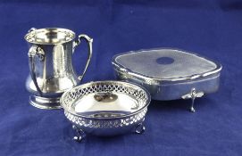 A George V silver trinket box, tyg and nut dish. A George V silver trinket box, of lozenge form,