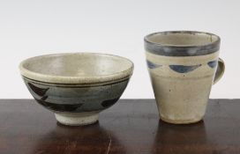 A St Ives pottery bowl and a similar mug, post war, 5.3in. and 4in. A St Ives pottery bowl and a