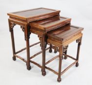A 20th century Chinese rosewood nest of three tea tables, W.2ft A 20th century Chinese rosewood nest