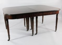 A large early 19th century mahogany extending dining table, overall 11ft 10in. x 4ft A large early