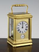 An early 20th century French gilt brass hour repeating alarum clock, 5.5in. An early 20th century