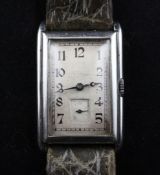 A gentleman`s early 1930`s Art Deco Omega steel wrist watch, A gentleman`s early 1930`s Art Deco