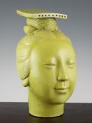 A Chinese yellow glazed porcelain head of a Guanyin A Chinese yellow glazed porcelain head of a