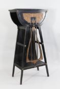 A Continental ebonised Secessionist stand, probably German / Austrian, overall 4ft 3in. x 2ft 1.5in.