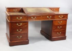 A Victorian mahogany pedestal desk, W.5ft A Victorian mahogany pedestal desk, with raised back and