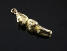 A pre-Columbian? gold fertility figural pendant, 1.5in. A pre-Columbian? gold fertility figural