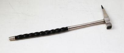 A plated ice pick, with tarnished whale bone handle