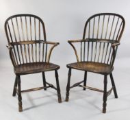 A pair of country elm seat stick back armchairs, A pair of country elm seat stick back armchairs,