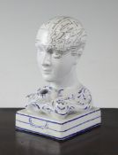 A 19th century pottery phrenology head inkwell, overall 5.5in. A 19th century pottery phrenology