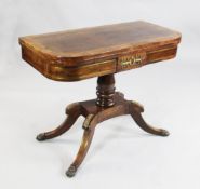 A Regency rosewood folding card table, W.3ft A Regency rosewood brass strung and gilt brass