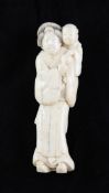 A Japanese walrus ivory group of a lady and child A Japanese walrus ivory group of a lady and child,