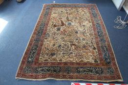A Persian hunting rug, 6ft 11in by 4ft 6in. A Persian hunting rug, with field of horseman, wild