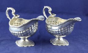A good pair of early George III silver pedestal sauceboats by William & James Priest, 21.5 oz. A