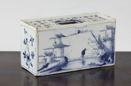 An English delftware blue and white flower brick, mid 18th century, 4.75in. An English delftware