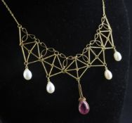 A stylish 18ct gold, pink tourmaline and baroque pearl drop necklace, 20.5in. A stylish 18ct gold,