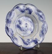 A Delft ware lobed dish, London or Bridlington, late 17th century, 8.5in., cracks An English