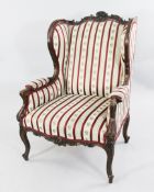A French Louis XV design wing back armchair, A French Louis XV design wing back armchair, with