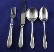 A 1970`s suite of silver cutlery by Garrard & Co, weighable silver 147.5 oz. A 1970`s suite of