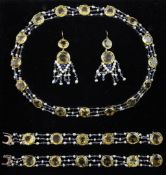 A good early 20th century gold, citrine, baroque pearl and sapphire set parure, necklace 19.5in. A