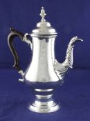 A George III silver coffee pot, gross 29 oz. A George III silver coffee pot, of baluster form,