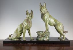 An Art Deco green patinated metal figure group modelled as two Alsatians, 26in. An Art Deco green