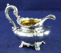 A William IV silver cream jug, 7 oz. A William IV silver cream jug, of squat circular form, with