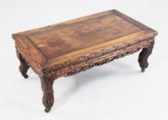 An early 20th century Chinese opium table An early 20th century Chinese carved rosewood