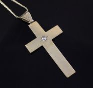 A 9ct gold diamond set cross pendant on 18ct gold chain, 26in A 9ct gold diamond set cross
