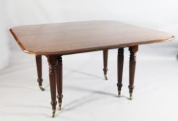 A Regency mahogany extending dining table, extends to approx. 9ft 7in. A Regency mahogany