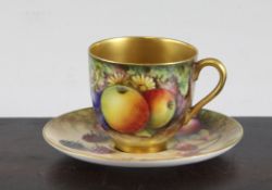 A Royal Worcester fruit painted cabinet coffee cup and saucer, date code for 1919, 3.75in. A Royal