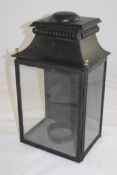 An early 20th century black painted wall lantern, 18in. An early 20th century black painted wall