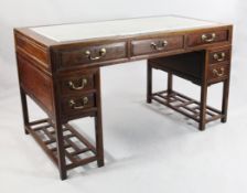 A 20th century Chinese rosewood desk, W.4ft 8in. A 20th century Chinese rosewood desk, with inset