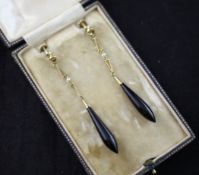 A pair of 15ct gold, black onyx and seed pearl drop ear clips, 2.5in. A pair of 15ct gold, black