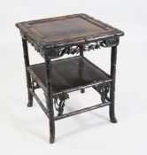 An early 20th century Chinese occasional table, W.1ft 8in. An early 20th century Chinese carved