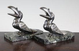 H. Moreau. A pair of French Art Deco silvered metal stylised hornbill birds, 6.5in. H. Moreau. A