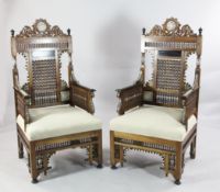 A pair of 19th century Moorish armchairs, A pair of 19th century Moorish armchairs, with